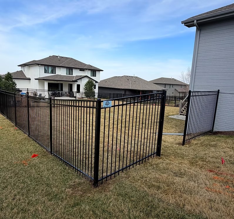 Black ornamental iron fence installed in Bellevue, Nebraska by Taylormade Fence LLC